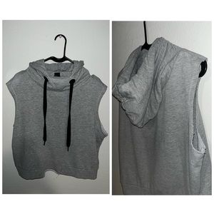 Gray sleeveless hoodie with low cut sides